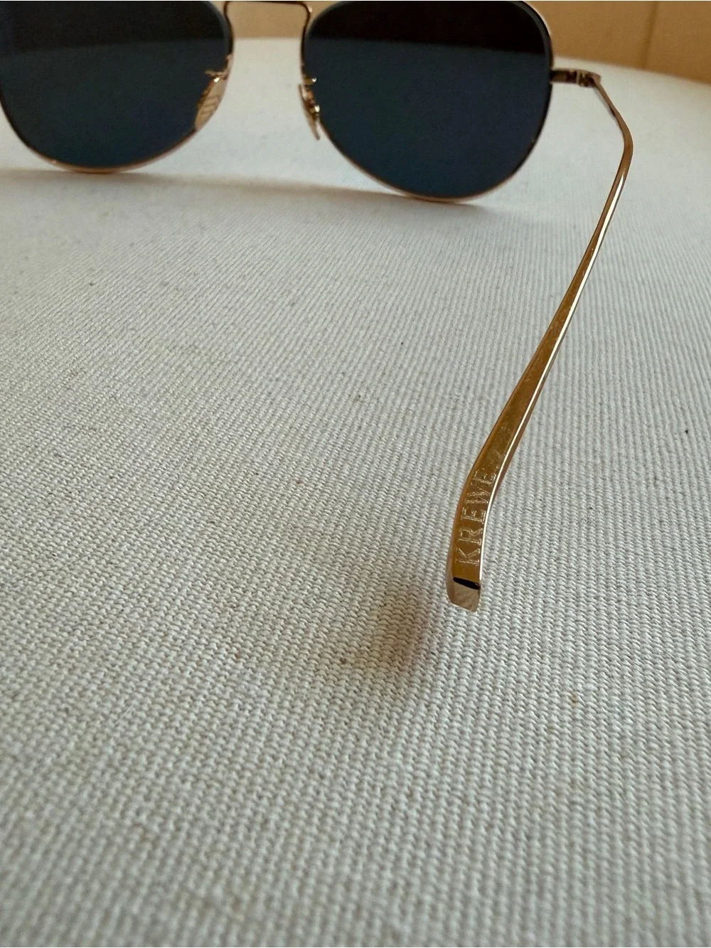 KREWE Gold Frame Sunglasses with Black Lenses